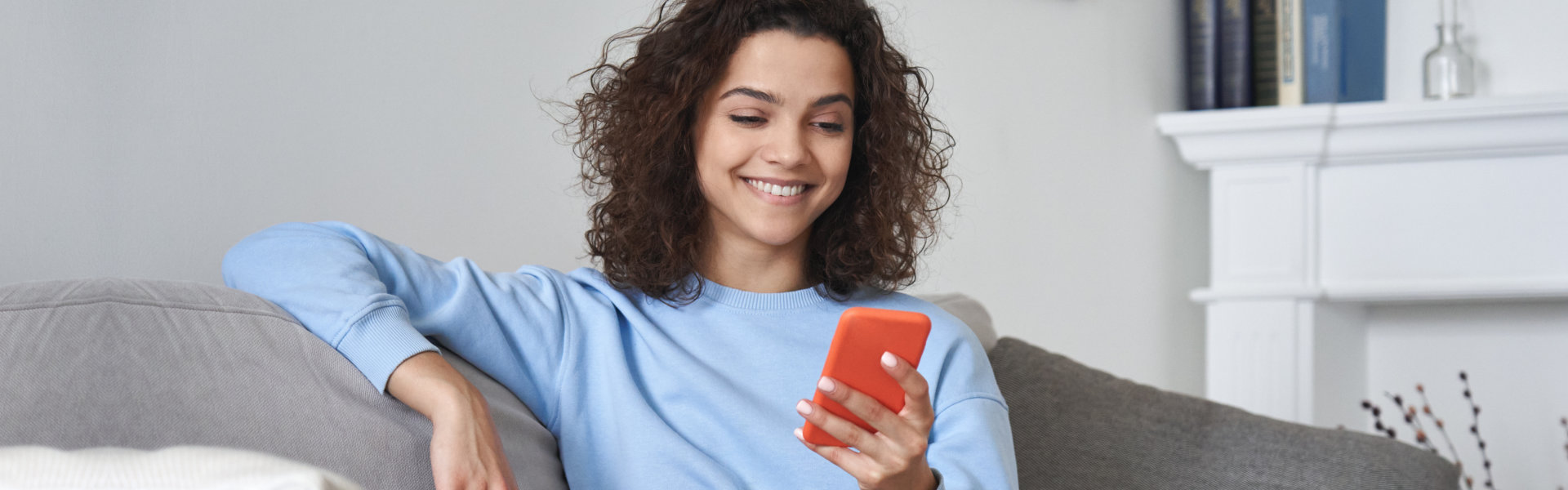 woman looking at her phone
